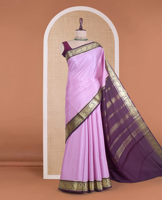 Pink plain Mysore silk saree, contrast traditional border of peacocks, and zari design pallu
