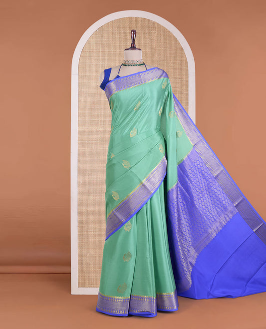 Green peacock buttas Mysore silk saree, contrast traditional zari design border, and intricate pallu