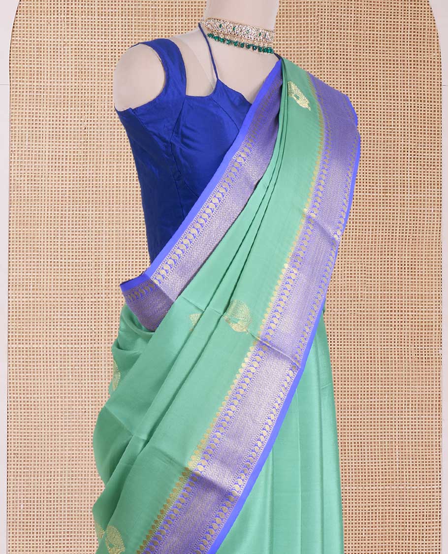 Green peacock buttas Mysore silk saree, contrast traditional zari design border, and intricate pallu