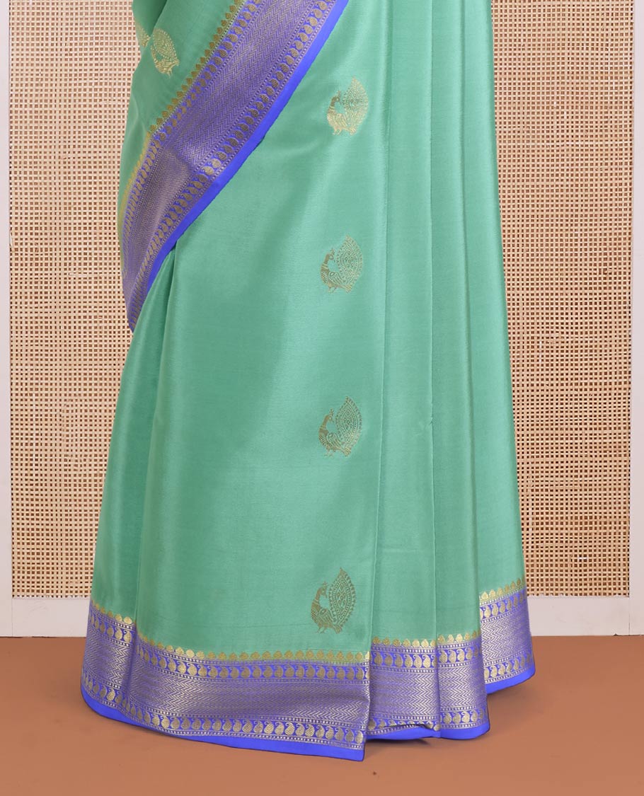 Green peacock buttas Mysore silk saree, contrast traditional zari design border, and intricate pallu