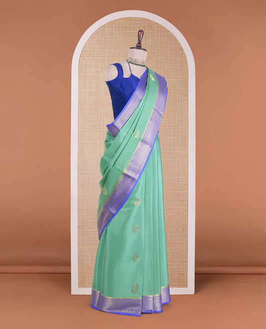 Green peacock buttas Mysore silk saree, contrast traditional zari design border, and intricate pallu