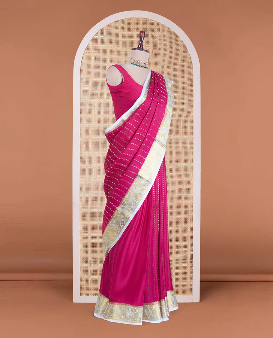 Pink zari design Mysore silk saree, contrast peacock chakra motifs border, and traditional zari design woven pallu