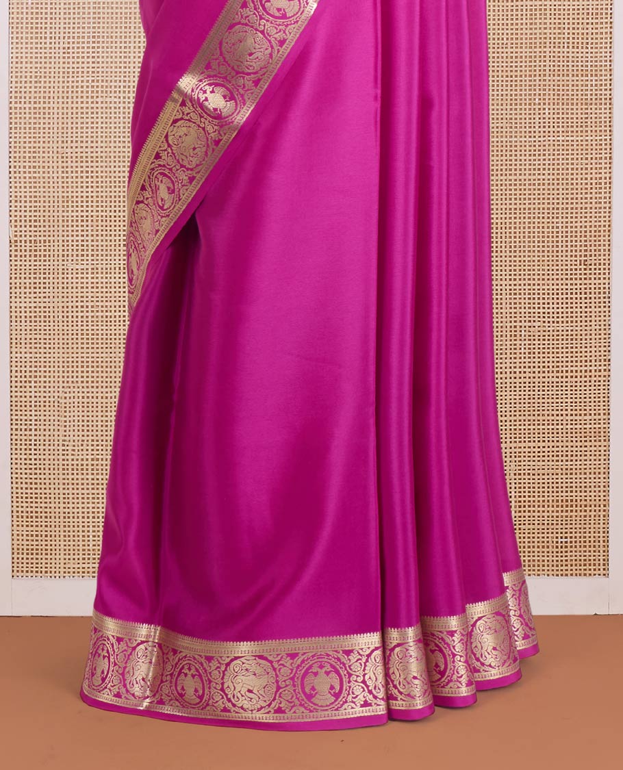 Rani plain Mysore silk saree, zari border of Mythological animal characters, and zari striped pallu