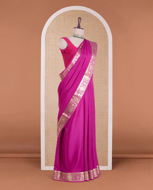 Rani plain Mysore silk saree, zari border of Mythological animal characters, and zari striped pallu