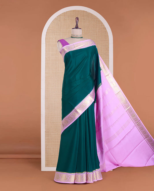 Dark green plain Mysore silk saree, contrast traditional zari border of peacocks, and zari design pallu
