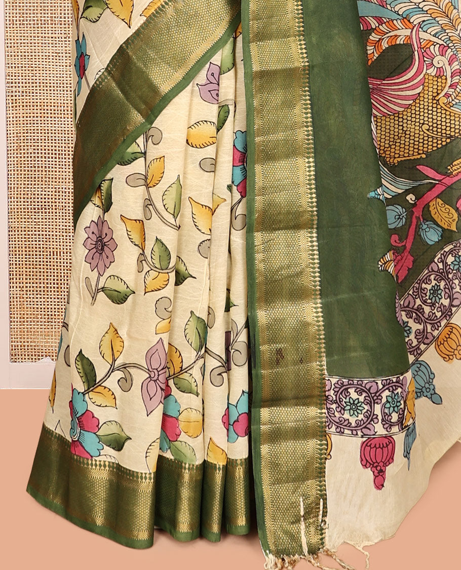 Light Yellow Kalamkari Silk Saree, Elegantly Framed with Floral Vine Print, a Contrast Traditional Zari Border, Pallu Features Peacocks, and a Contrast Blouse