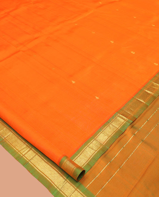 Orange Kanchipuram Silk Saree, Detailed with Zari Buttas, Complemented by a Contrast Border of Banaras and Mayil Kann Design, Pallu of Zari Design, and No Blouse