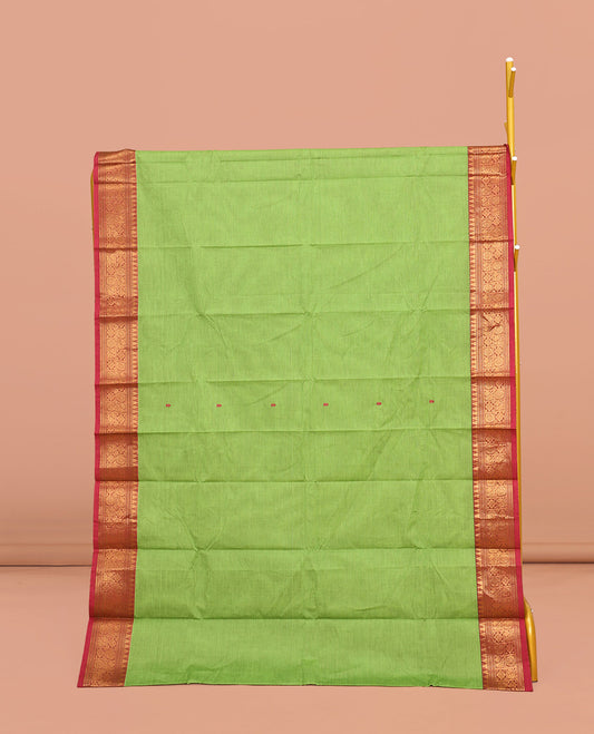 Green Chettinad Cotton Saree, Adorned with Buttas All Over Its Body, Complemented by a Contrast Traditional Zari Design Border, Pallu of Stripes, and Paired with a Matching Blouse