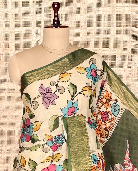 Light Yellow Kalamkari Silk Saree, Elegantly Framed with Floral Vine Print, a Contrast Traditional Zari Border, Pallu Features Peacocks, and a Contrast Blouse