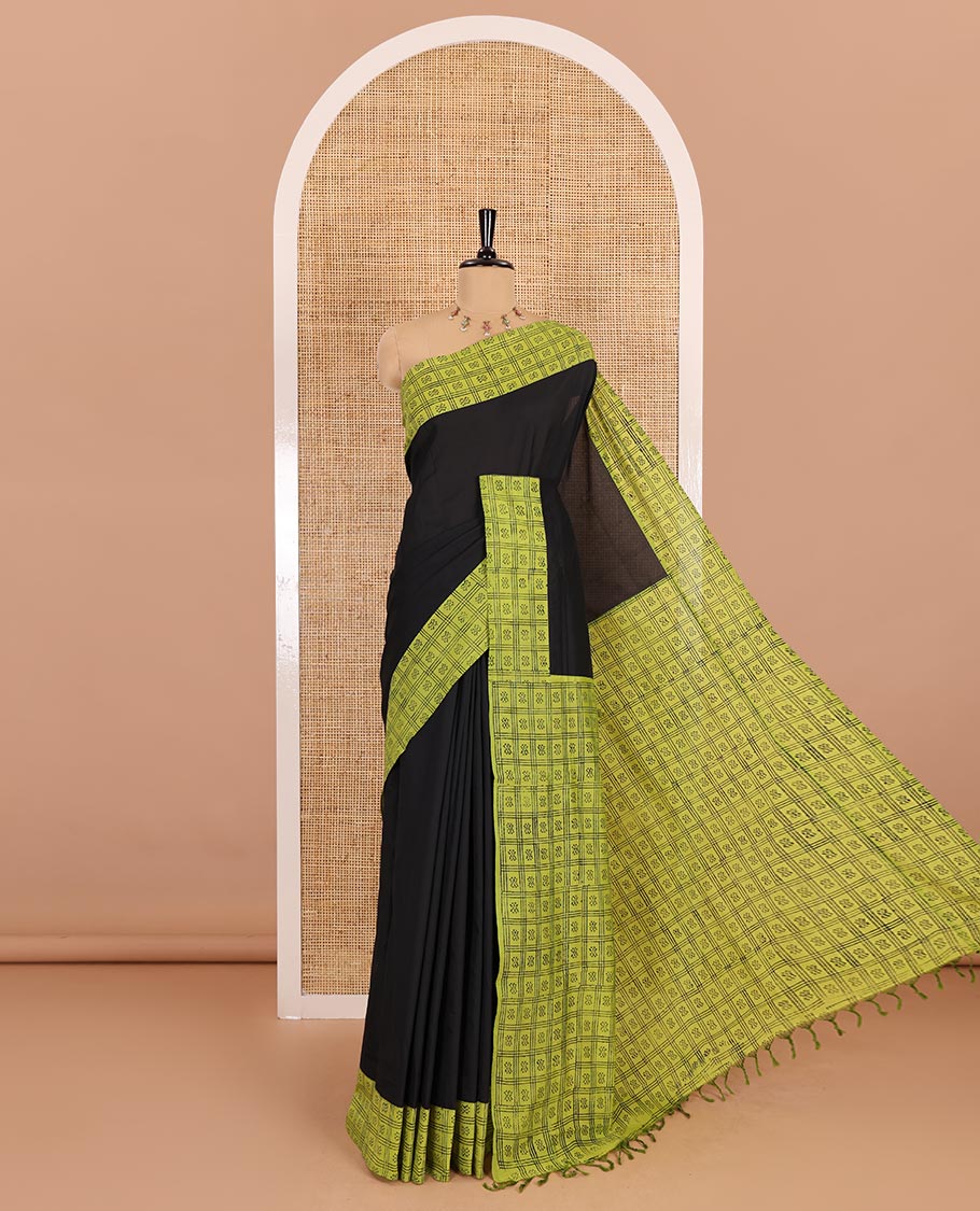 Black plain South cotton saree, contrast block printed border, and pallu of butta enclosed checks print, and block printed blouse