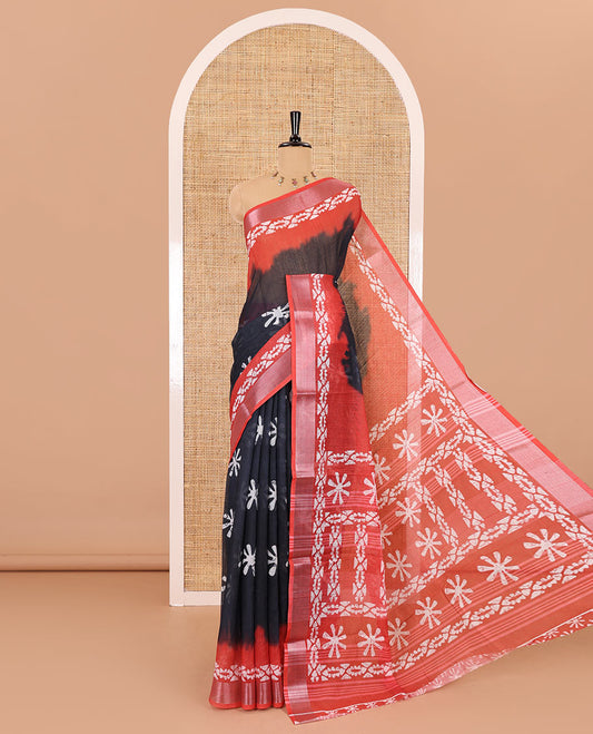 Black flower motifs batik printed linen cotton saree, contrast printed with zari woven border, batik printed pallu, and a contrast printed blouse