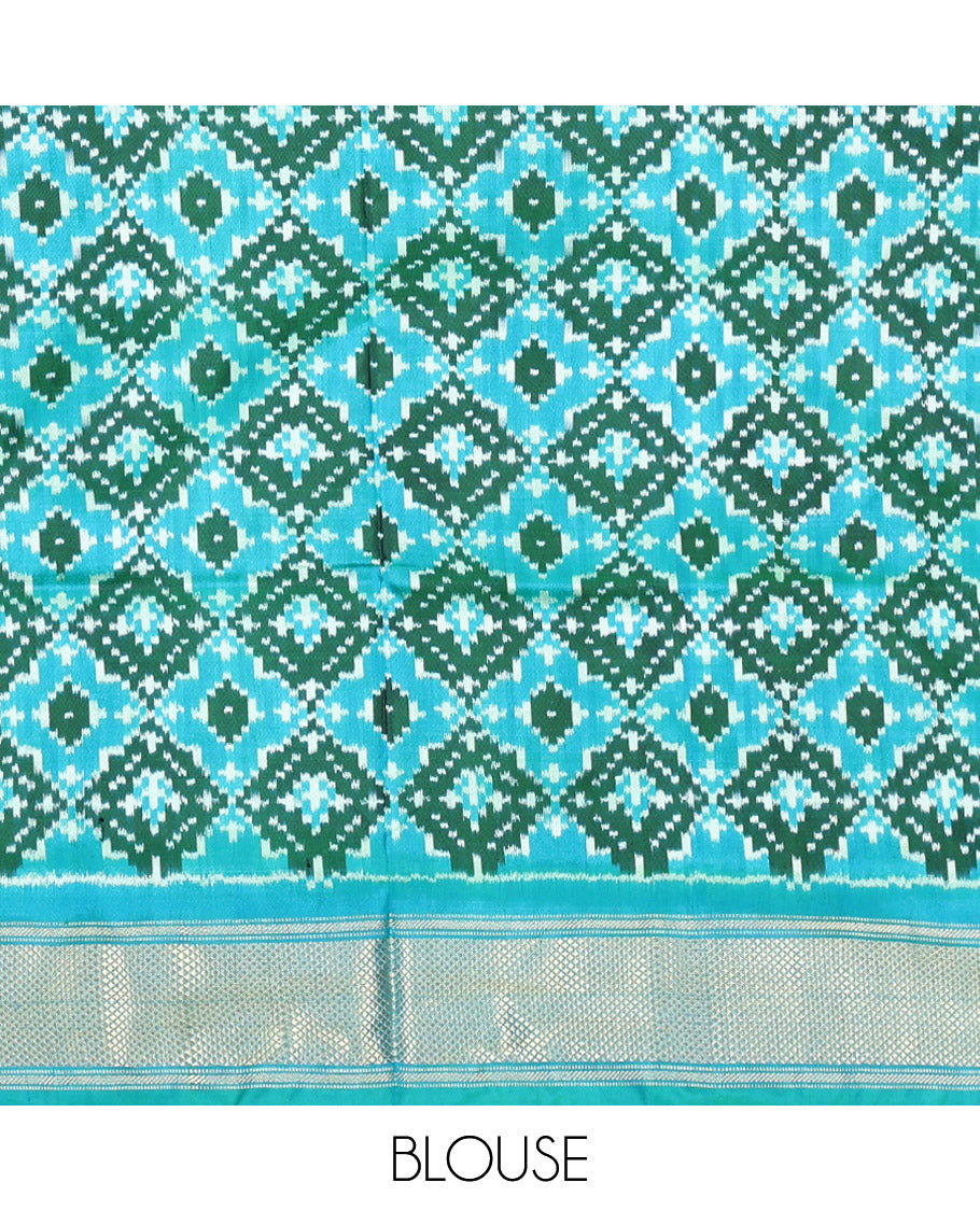 Blue Pochampally Ikat Silk Saree, Accentuated with Ikkat Buttas on Its Body, Complemented by Contrast Temple Traditional Design Border, Pallu of Intricate Patterns, and Paired with a Contrast Blouse