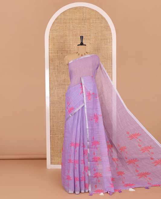 Lavender Pichwai lotus printed linen cotton saree, piping zari border, colorful tasselled lotus printed pallu, and a contrast lotus printed blouse