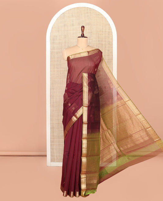 Brown Silk Cotton Saree, Embellished with Zari Buttas All Over Its Body, Complemented by Contrast Traditional Zari Designs Woven Border, Intricately Designed Pallu and Paired with a Contrast Blouse