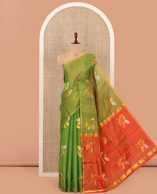 Borderless parrot green Uppada Silk Saree Artfully Detailed with Leaf Zari Buttas, Complemented by Contrast Pallu Steeped with Leaf Zari Designs, and Paired with a Contrast Blouse