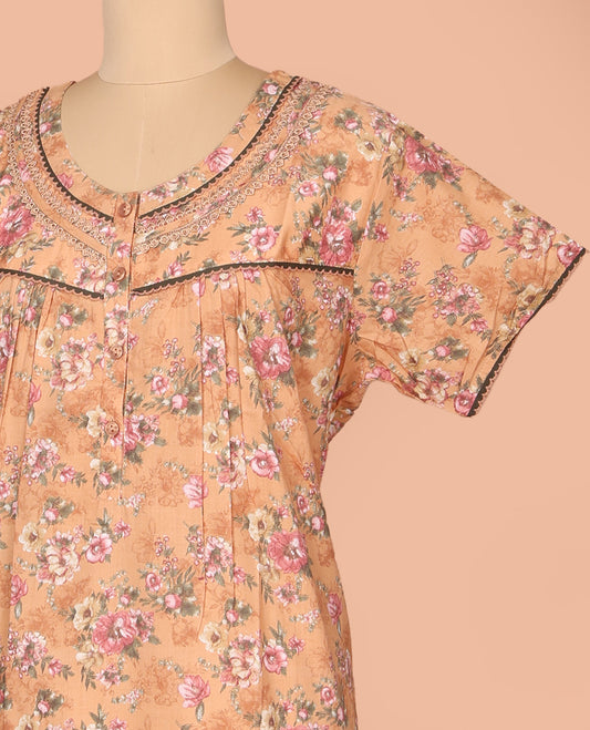 Orange Cotton Nighty Decked Up with Floral Print, Featuring Lace Work, Round Front Neck, and Half  Sleeves