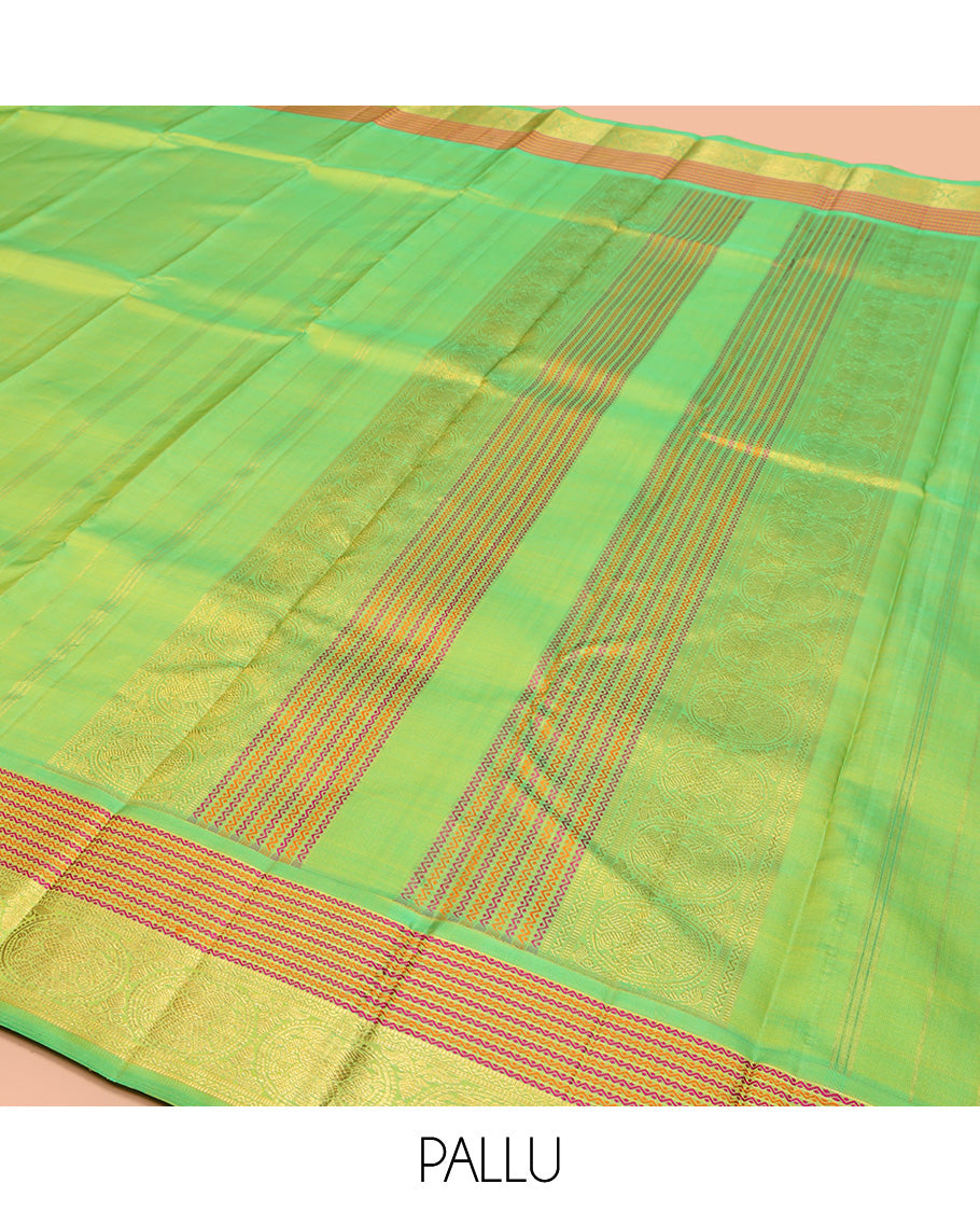 Green Plain Kanchipuram Silk Saree, Highlighted by Self-Border of Neli, and Round Iruthalai Pakshi Designs, Pallu of Same Design, and Paired with a Matching Blouse