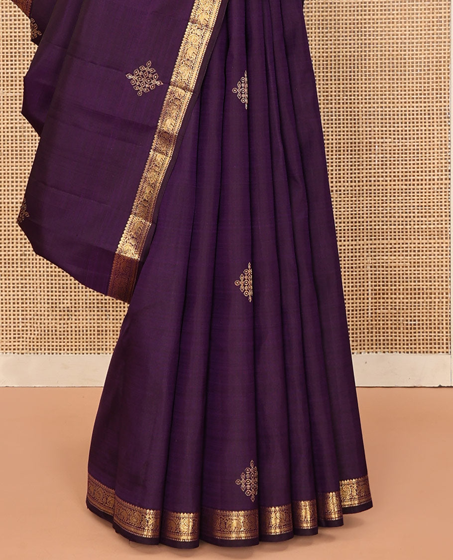 Purple Kanchipuram Silk Saree, Enriched with Kolam Buttas All Over Its Body, Highlighted by Zari Border of Rekku, Muthu, Mayil, Yaanai, and Rettai Neli Designs, Pallu Gleamed with Diagonal Stripes and Mayil Designs, and Paired with a Matching Blouse