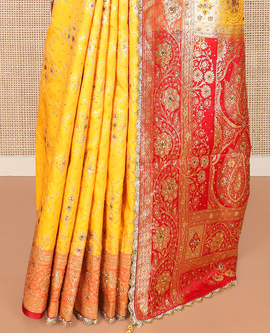 Yellow Art Vastrakala Silk Saree Mesmerized with Meenakari Jacquard with Stone Work All Over Its Body, Complemented by a Contrast Floral Creeper Zari Stone Work Lace Border, Pallu Detailed in Zari and Stone Work, and Paired with a Contrast Blouse