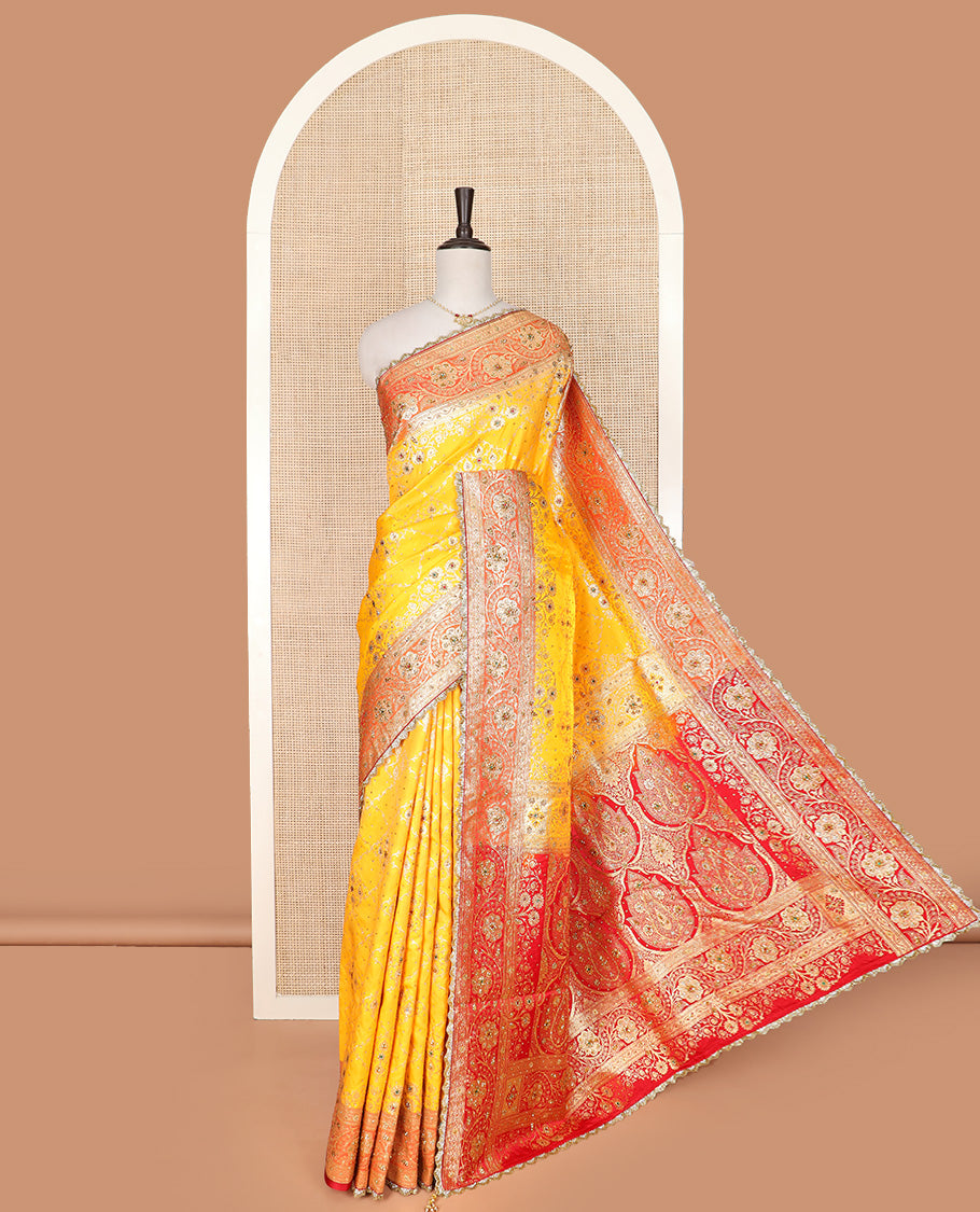 Yellow Art Vastrakala Silk Saree Mesmerized with Meenakari Jacquard with Stone Work All Over Its Body, Complemented by a Contrast Floral Creeper Zari Stone Work Lace Border, Pallu Detailed in Zari and Stone Work, and Paired with a Contrast Blouse