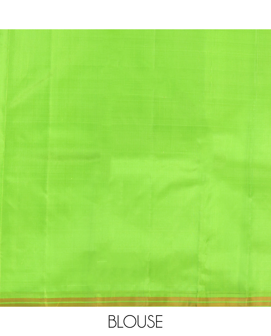 Green Kanchipuram Silk Saree, Subtly Woven with Buttas, a Piping Border, Pallu of Peacock Designs, and a Matching Blouse