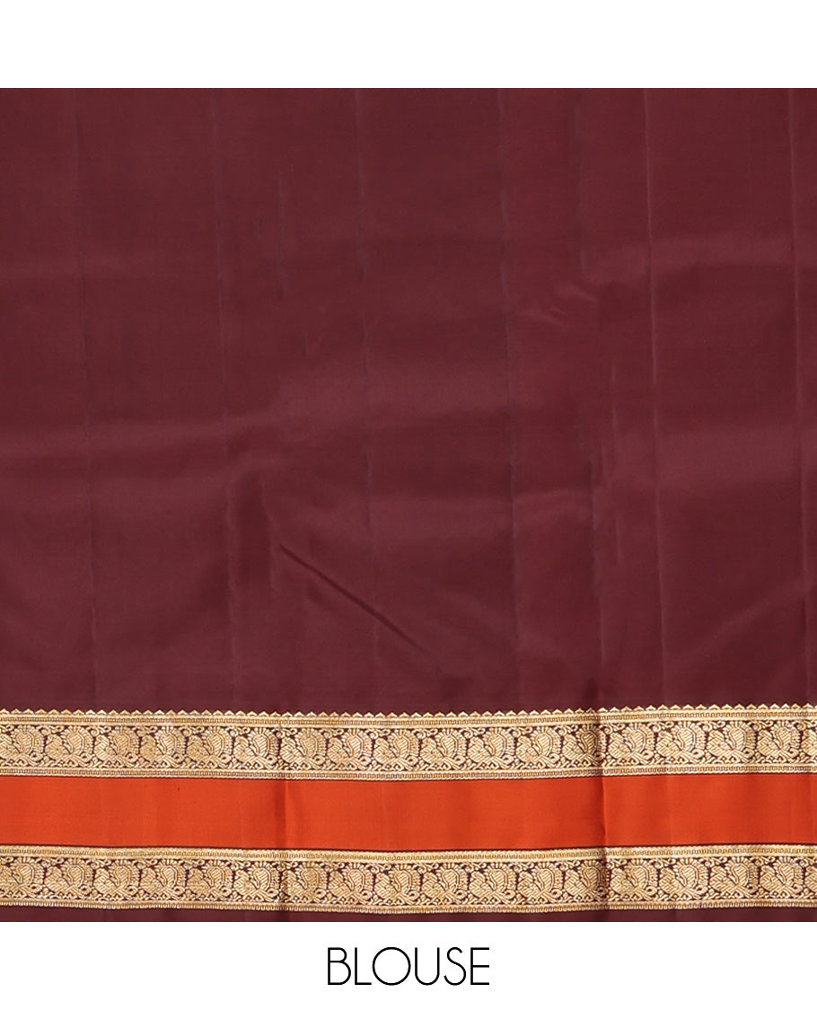 Green Vasundhara Silk Saree, Woven with Zari Buttas All Over Its Body Complemented by Contrast Rettai Pettu Border of Rekku and Yaanai Designs, Grand Pallu and Paired with a Contrast Blouse