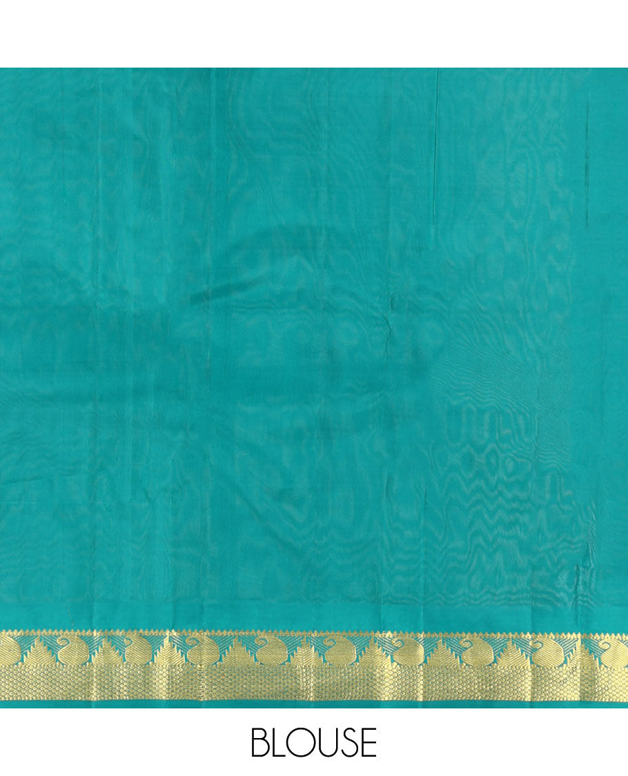 Green Kanchipuram Silk Saree, Woven with Zari Buttas, Highlighted by Zari Border of Rekku, Muthu, Manga, and Mayil Kann Designs, Pallu of Zari Design, and a Matching Blouse
