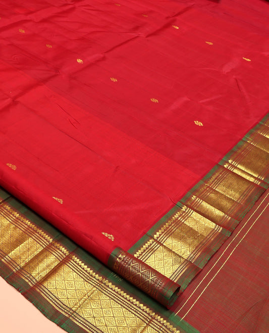 Red Kanchipuram Silk Saree, Woven with Zari Buttas, Complemented by Contrast One-Sided Border of Salngai, Banaras, Muthu, and Jaal Designs, Zari Design Pallu, and No Blouse