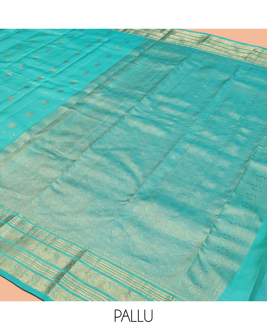 Turquoise Vasundhara Lite Silk Mix Saree, Decked Up with Zari Buttas, Highlighted by a Zari Border of Kathir, Muthu, and Mayil Designs, Intricate Pallu, and a Matching Blouse