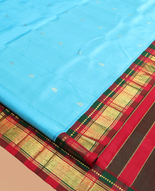 Blue Kanchipuram Silk Saree, Subtly Woven with Zari Buttas, a Contrast Korvai One-Sided Border of Rekku, Banaras, Muthu, and Jaal Design, Zari Design Pallu, and No Blouse