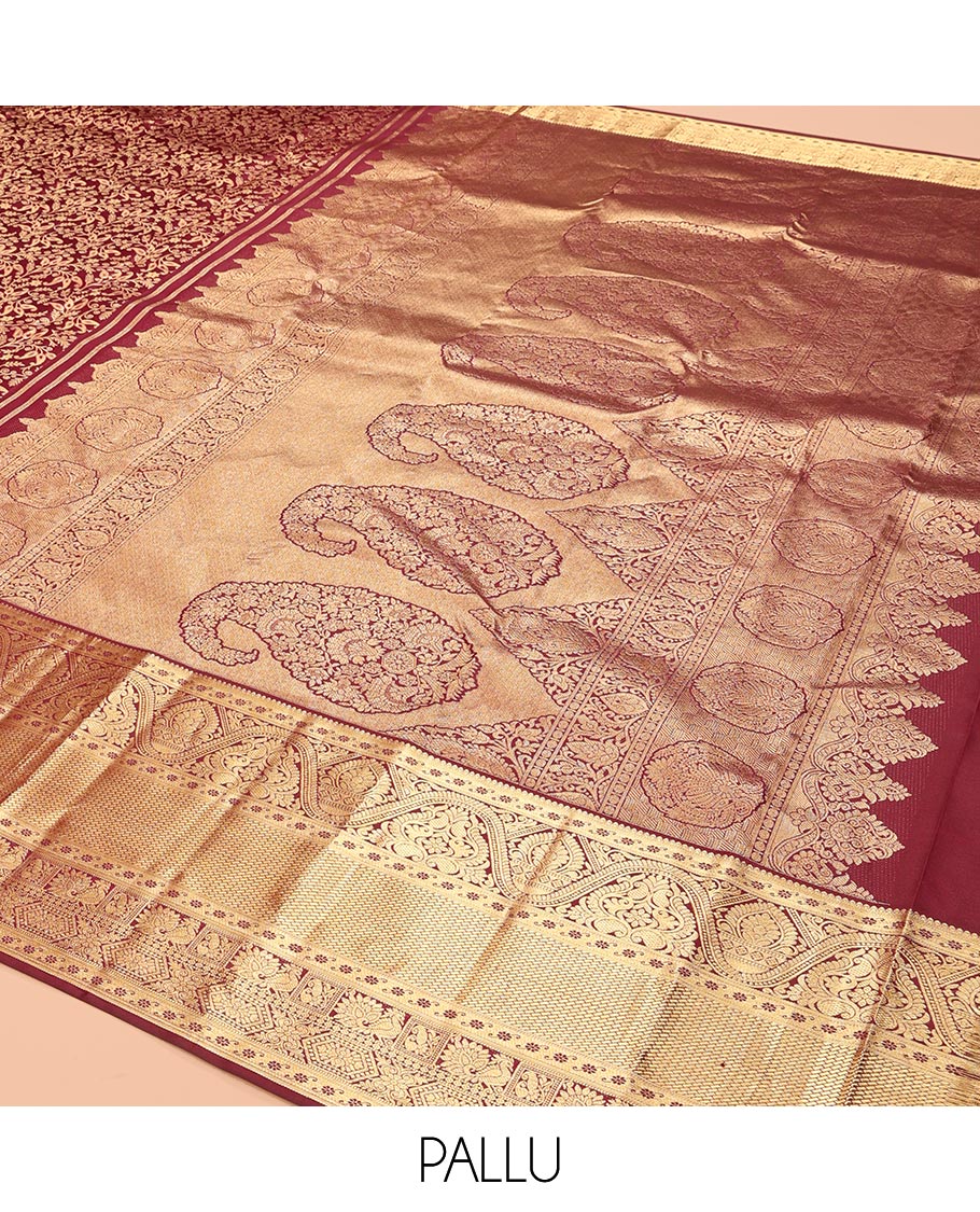 Maroon Kanchipuram Wedding Silk Saree, Enriched with Jacquard Design, a Zari Border of Traditional Designs, Intricately Designed Pallu, and a Matching Blouse