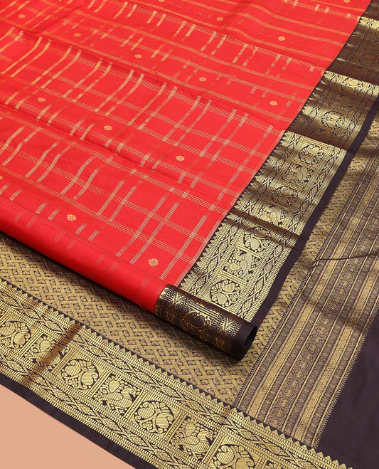 Orange Vasundhara Silk Saree, Richly Detailed with Zari Butta Enclosed Checks All Over Its Body, Complemented by a Contrast Border of Rekku, Muthu, Banaras, Mayil, and Manga Designs, Grand Pallu, and Paired with a Contrast Blouse