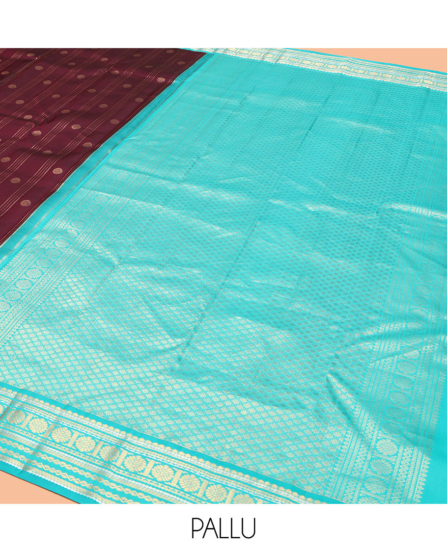 Maroon Vasundhara Silk Saree, Adorned with Stripes and Chakram Buttas, Complemented by a Contrast Border of Salngai, Neli, Kathir, and Chakram Design, Intricate Pallu, and a Contrast Blouse