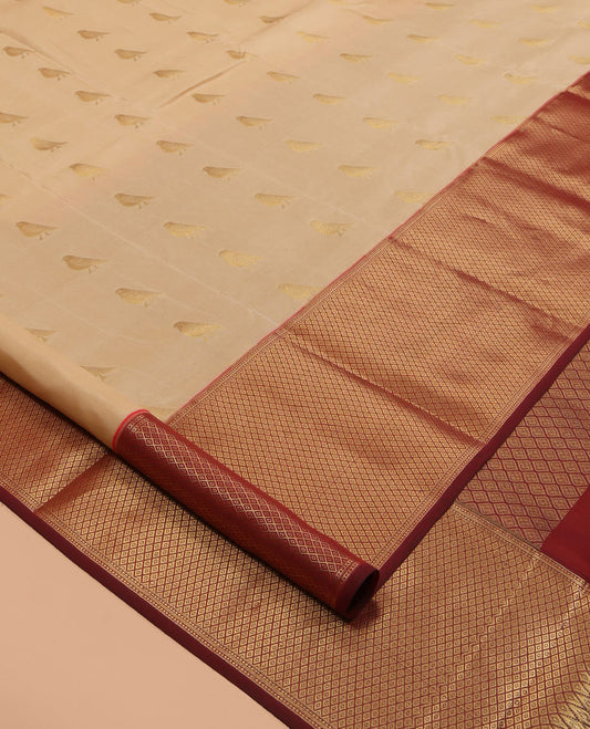 Sandal Vasundhara Lite Silk Mix Saree, Adorned with Pakshi Buttas, a Contrast Mayil Kann Border, Grand Pallu, and a Contrast Blouse