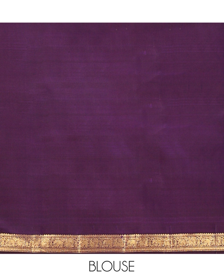 Purple Kanchipuram Silk Saree, Enriched with Kolam Buttas All Over Its Body, Highlighted by Zari Border of Rekku, Muthu, Mayil, Yaanai, and Rettai Neli Designs, Pallu Gleamed with Diagonal Stripes and Mayil Designs, and Paired with a Matching Blouse