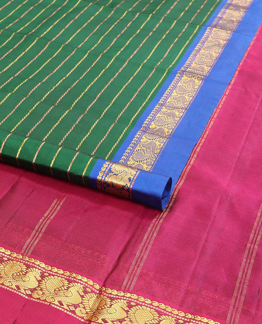 Green striped kancheepuram silk saree with contrast ganga jamuna border of paisley, mayil design & zari design pallu