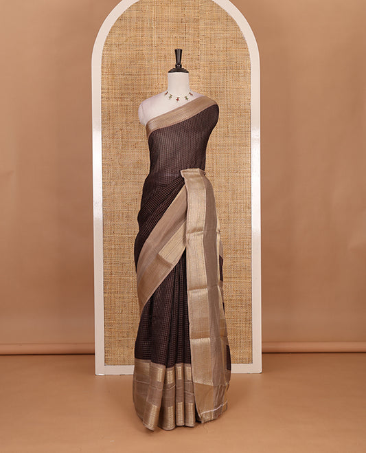 Brown Checked saree with contrast zari border and contrast striped pallu along with contrast blouse
