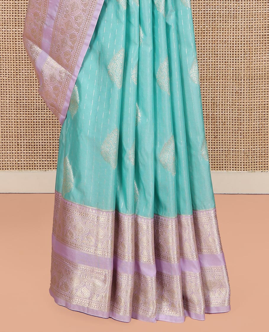 Blue Budget Silk Saree, Steeped in the Richness of Zari Buttas All Over Its Body, Complemented by Contrast Varisai Pettu Traditional Zari Design Border, an Intricately Designed Pallu, and Paired with a Contrast Blouse