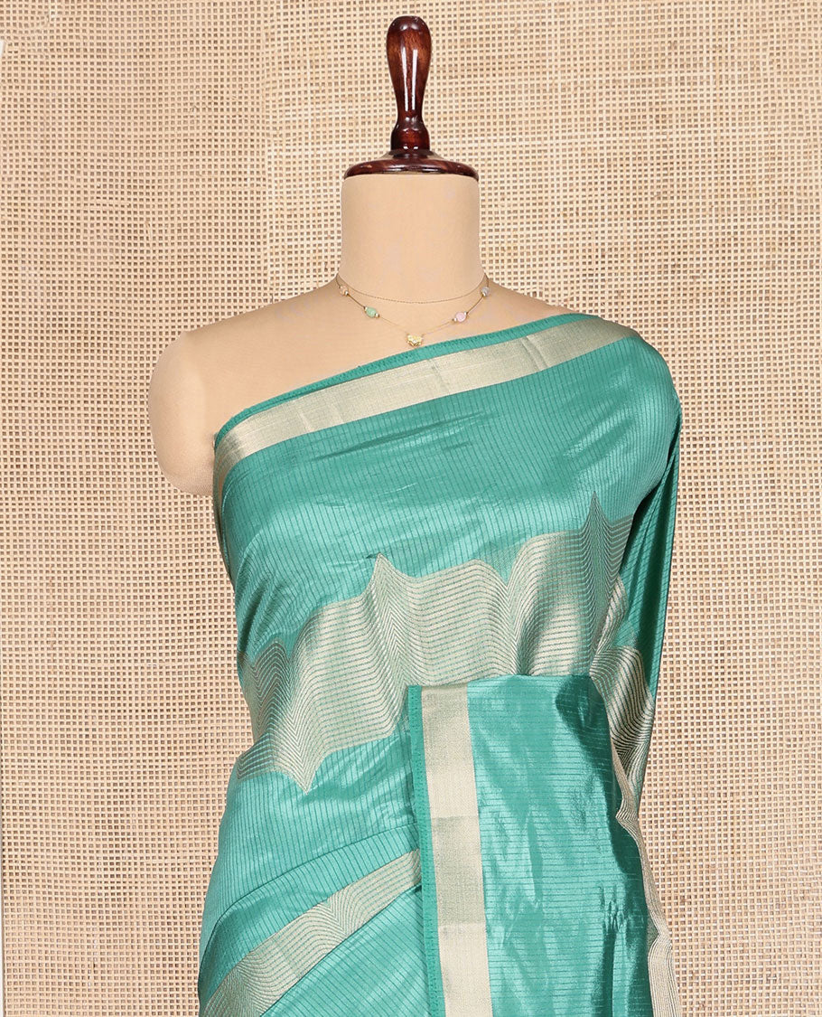 Green Dupion Silk Saree, Boldly Accentuated with Zig-Zag Stripes, Highlighted by Zari Border, Complemented by a Contrast Zari Striped Pallu, and a Contrast Blouse