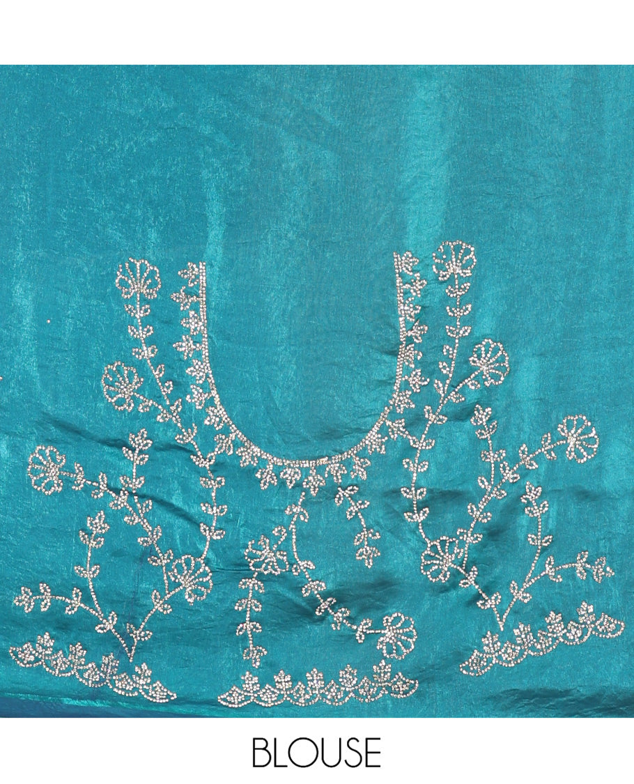 Blue Fendy Chiffon Saree, Highlighted by Swarovski Stone Work All Over the Body, Gleaming Swarovski Stone Work Border, a Self-Pallu, and Paired with a Fancy Designer Blouse
