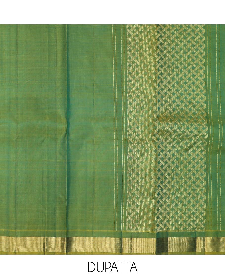 Blue pure-silk half-saree, zari buttas with contrast mayil chakra bordered skirt, contrast zari design blouse, and mat textured dhavani