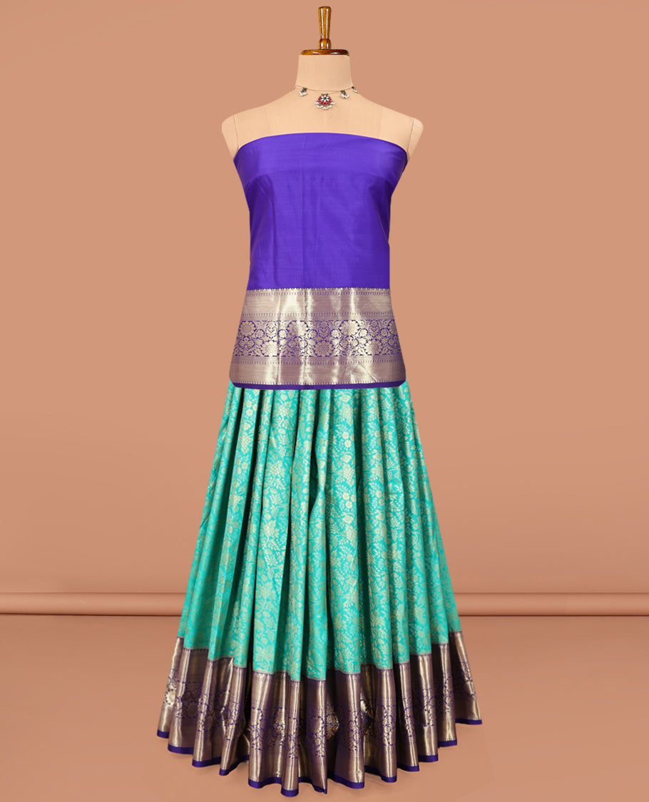 Turquoise Art Silk Material Half Saree, Bedecked with Jacquard Skirt, a Contrast Traditional Zari Border, Contrast Blouse, and an Intricate Dhavani
