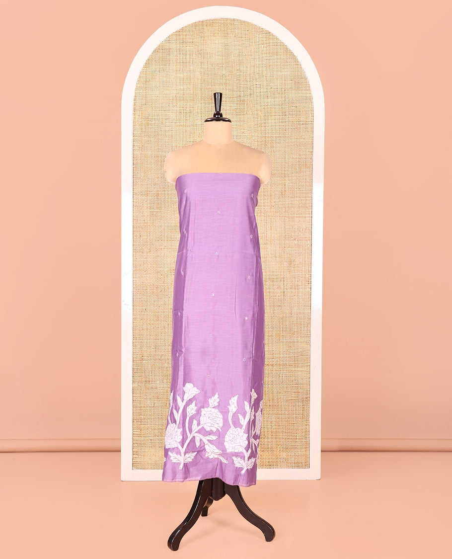 Lavender Mul Chanderi Material Chudidar Set, Elevated with Appliqué Floral Embroidery on Its Top, a Plain Santoon Bottom, and Paired Scallop Embroidered Mul Chanderi Dupatta