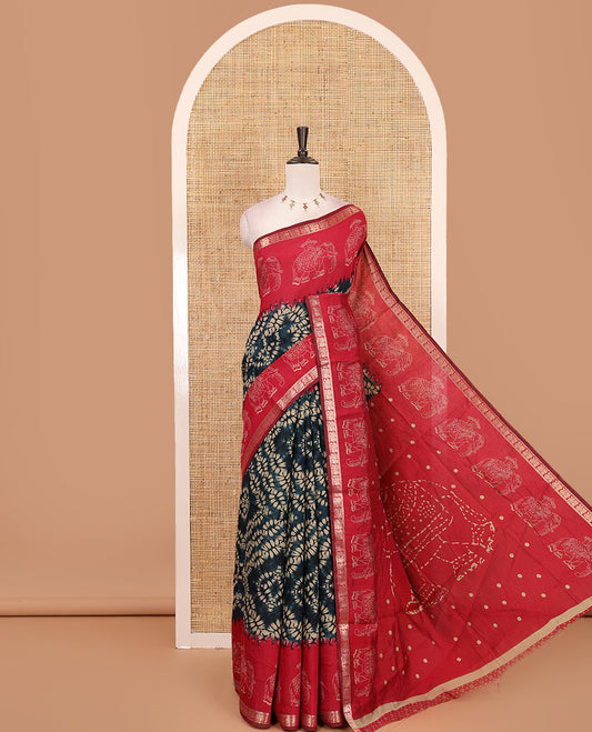 Blue diamond patterns Shibori-style printed muslin cotton saree, contrast elephant motifs printed border, batik elephant motifs pallu & contrast flower buttas printed blouse