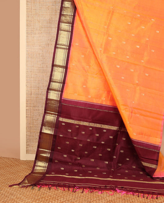 Orange buttas kancheepuram silk saree with contrast korvai border of banaras, thilakam mokku design & zari design border