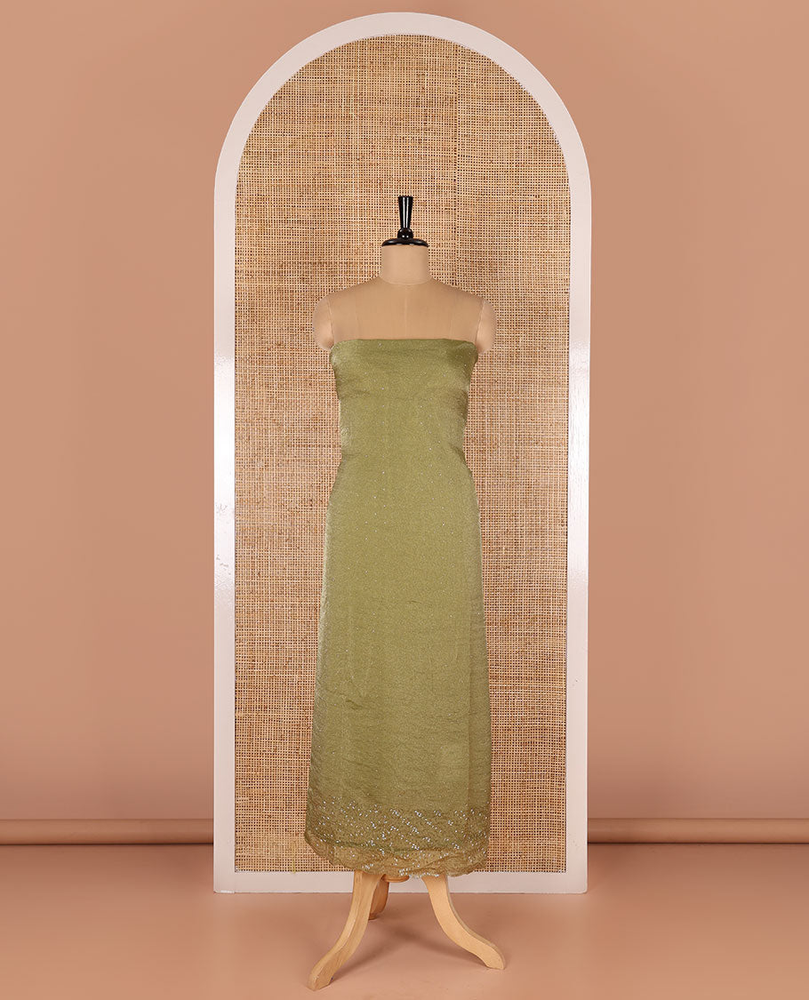 Green material chudidar set, stone work moss organza top, a matching bottom, and scallop stone work moss organza dupatta