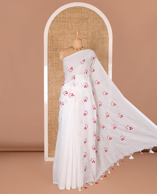 Borderless white and red floral motifs embroidered Khadi mul cotton saree with a matching plain blouse