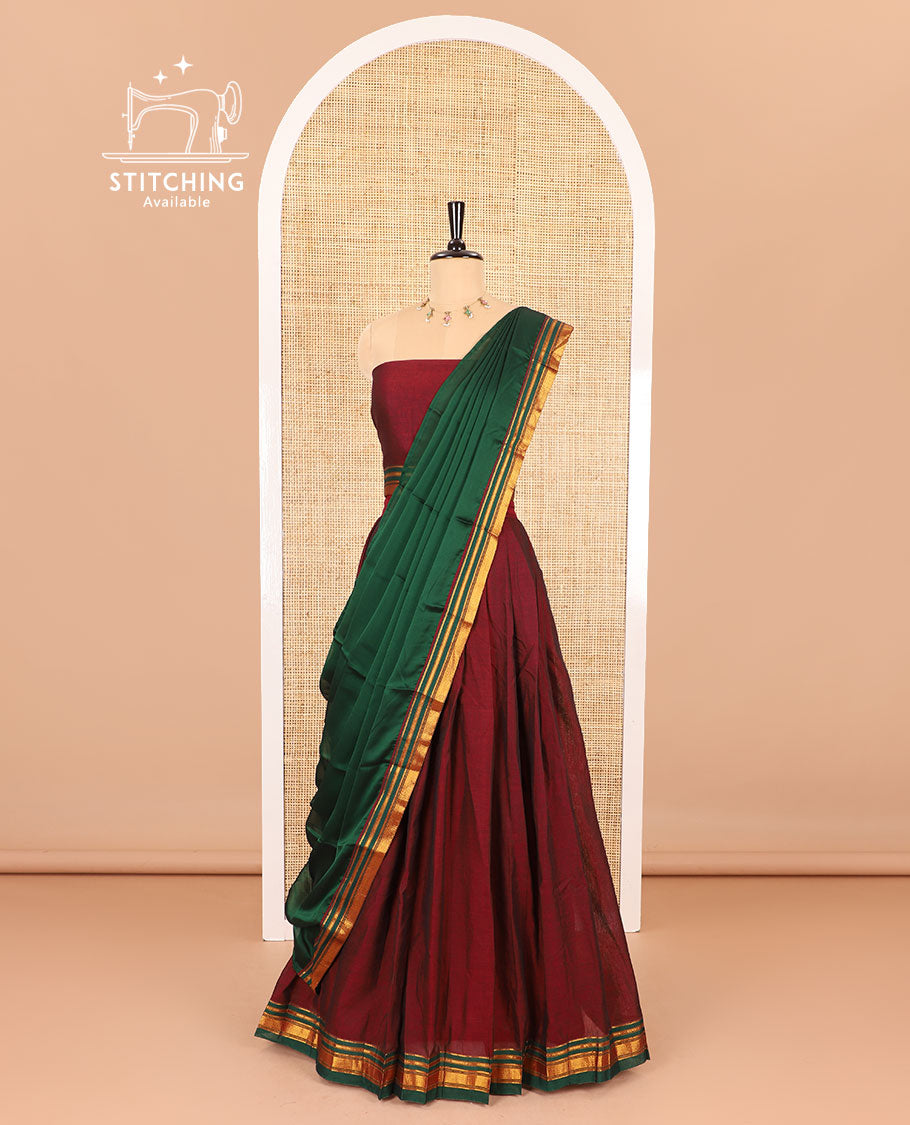 Maroon half-saree, plain with contrast traditional zari border skirt, matching zari bordered blouse, and contrast plain zari border dhavani
