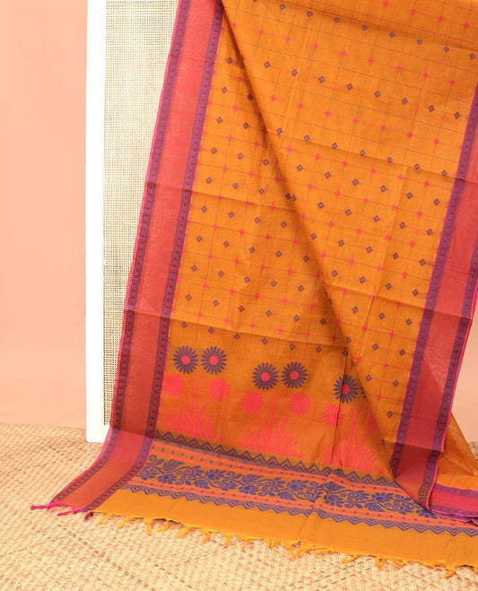 Orange checked, floral design coimbatore cotton saree with contrast intricate design border & floral design pallu