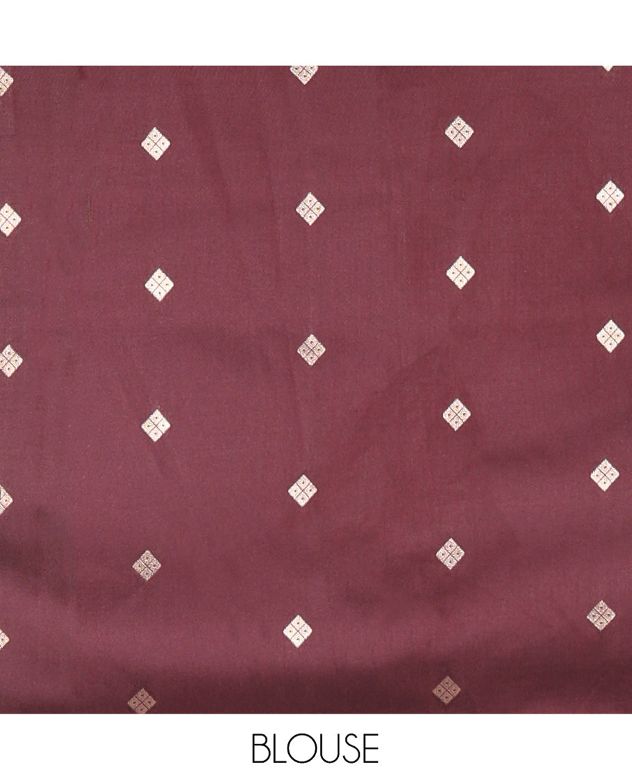 Brown Kanchi Soft Silk Saree, Delicately Woven with Zari Buttas All Over Its Body, Highlighted by Traditional Zari Design Border, Diagonally Striped Pallu, and Paired with a Matching Blouse
